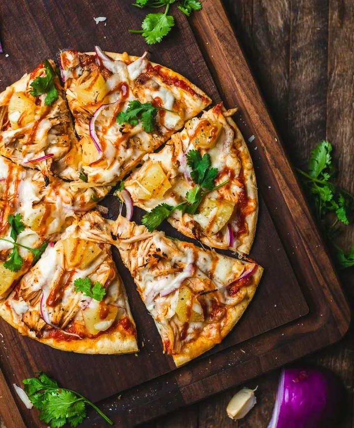 Freshly prepared pizza at Santini's Restaurant & Bar